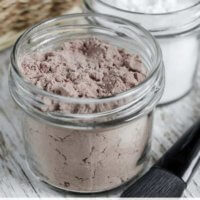 Three recipes for homemade DIY dry shampoo (or spray dry shampoos) for dark or light hair that are inexpensive to make and work as well as store bought!